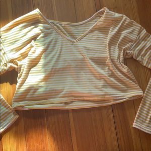 A cropped yellow and white top.